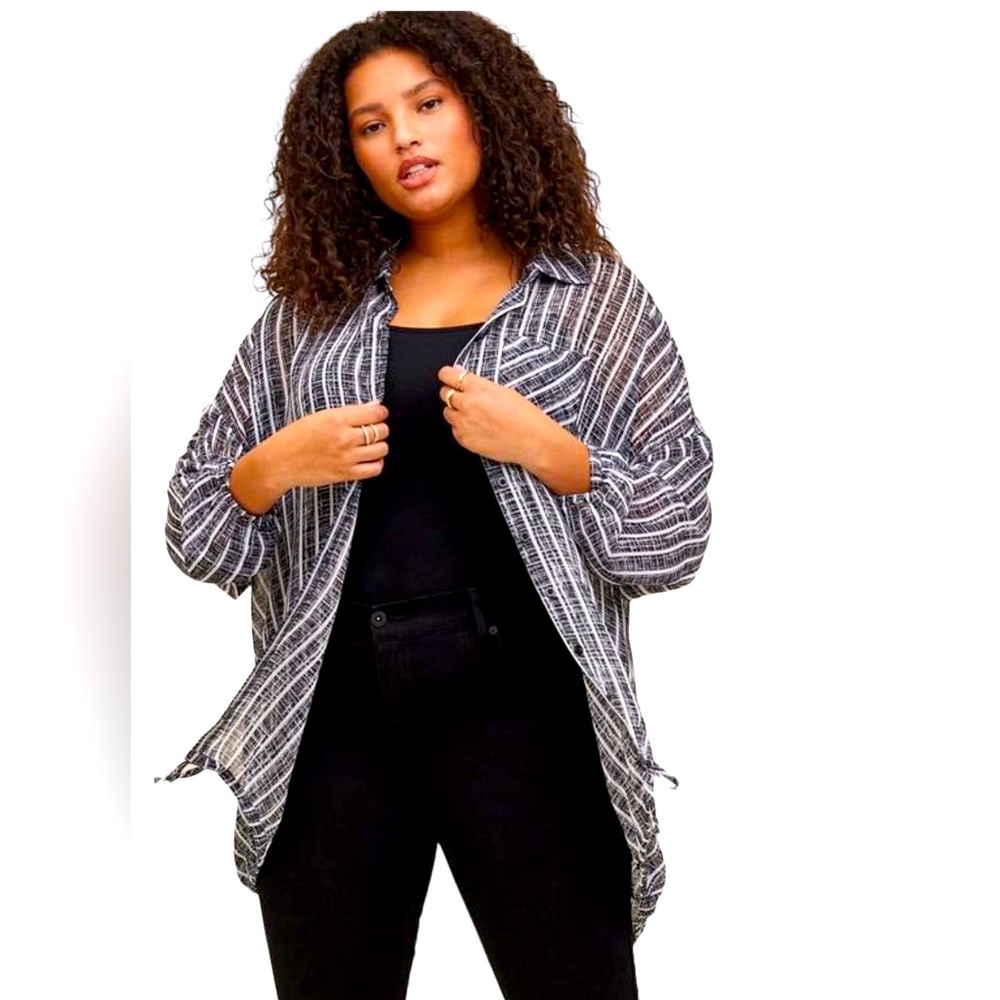 Torrid top size 3X back and white with vertical strips chiffon sheer bottom tie.
